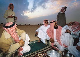 Mohammed Ali and other Murrah relax after an afternoon of testing their skills. 